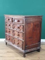 A 17th Century oak Chest fitted two short and three long drawers with geometric mouldings and turned