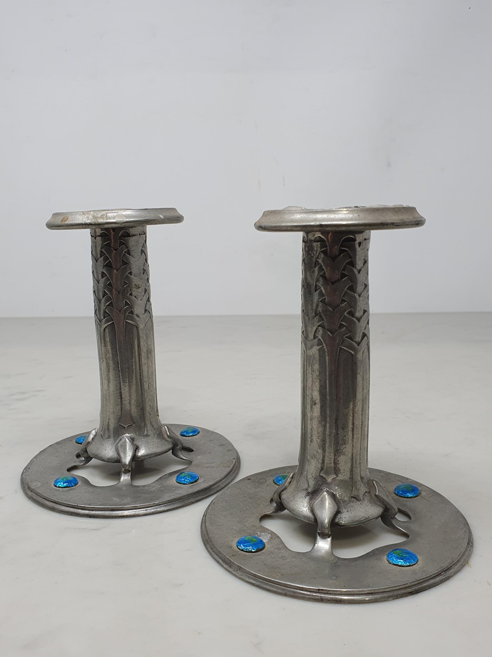 A pair of Arts and Crafts "Liberty and Co - Tudric Pewter" Squat Candlesticks with stylised - Image 3 of 13
