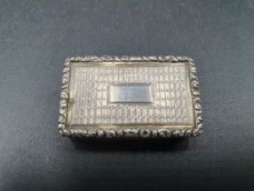 A William IV silver rectangular Vinaigrette with engine turning, foliate border and vacant