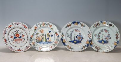 Four Antique Delft Plates with polychrome decorations, one with Bird and Flowers, and three with