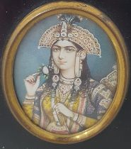 INDIAN SCHOOL, 19th CENTURY. Portrait miniature depicting a female dignitary, on ivory, oval, 2 1/