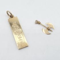 A 9ct gold Ingot Pendant, approx 15.80gms and a two headed Axe Charm stamped 585 approx 1.60gms