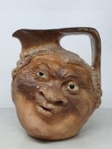 A Martin Brothers Stoneware Two Faced Barrister Jug, Signed & Dated "R.W Martin & Bros London &