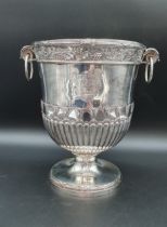 A George III silver Wine Cooler with fruiting vine friezes, leafage scroll and ring handles, semi-