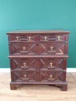 A 17th Century oak Chest of two short and three long drawers with moulded top and geometric