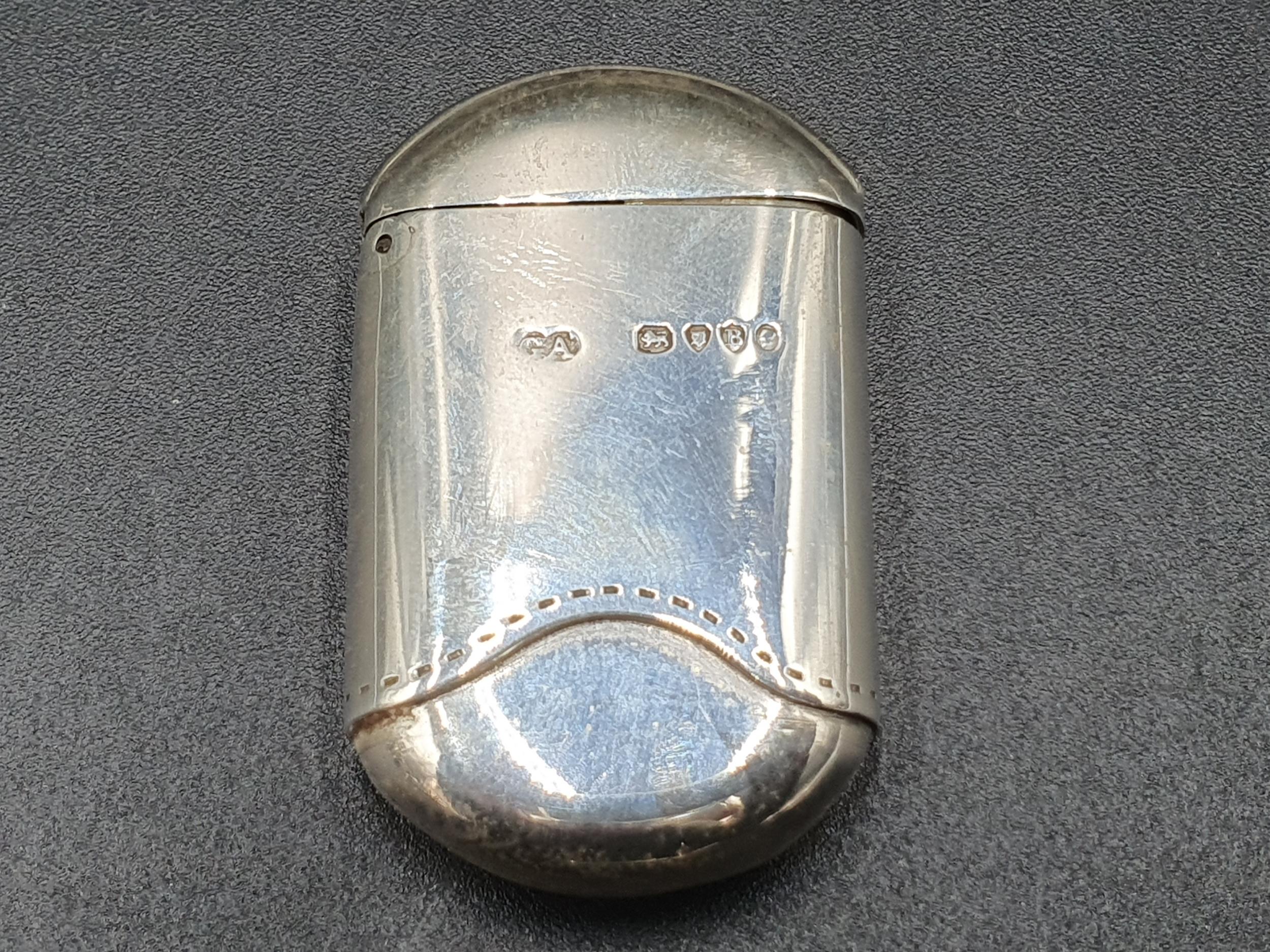 A Victorian silver Vesta Case in the form of a miniature Cigar case, London 1877, maker; G.A
