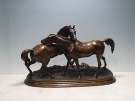 A French bronze equestrian group L'Accolade, mare and stallion, cast from a model by Pierre Jules