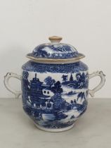 A Chinese Export blue and white two handled Lidded Jar and Cover, decorated with Pagoda in