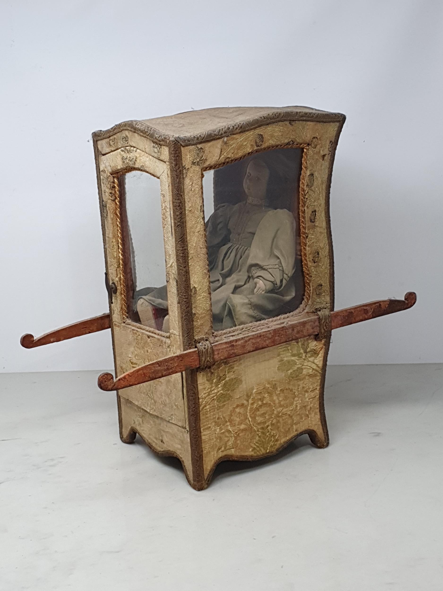 An antique Doll's Sedan Chair with fabric covering and glazed door 14in H x 7in W, with an antique - Image 2 of 4