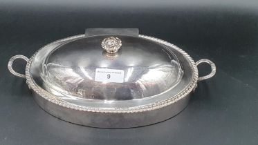 A Georgian Sheffield plated oval two handled Entree Dish and Cover with gadroon rim and flower