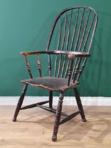 A 19th Century ash stick back Elbow Chair with early black paint remnants on turned supports