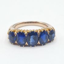 A Sapphire five stone Ring claw-set graduated oval-cut stones, ring size K-K 1/2, unmarked,