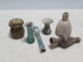 Six Roman glass Bottles