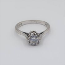 A Diamond single stone Ring illusion-set brilliant-cut stone in 18ct white gold, ring size J, approx