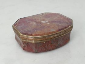 An 18th Century agate Box of octagonal form with hinged lid 3 1/4in W (cracks in agate)