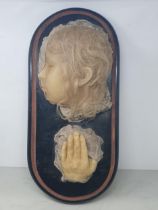 A Victorian wax Death Mask of a girl on ebonised dome base 1ft 7in W