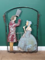 An antique Folk Art Pub Sign with carved figures of a Gentleman and Lady A/F within a metal frame