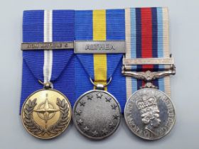 Three; NATO Medal with 'Non Article 5' Clasp, European Security and Defence Policy Medal with '