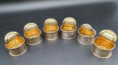 Six Continental silver Salts in the form of partially opened circular Tin Cans, marked 800, approx