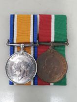 Mercantile Marine Medal engraved William Madge, together with 1914-18 War Medal possibly re-named