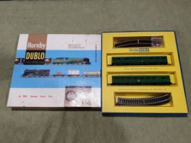 A boxed Hornby Dublo 2050 Suburban Electric Train Set, contents appear unused, Nr M-M condition, box