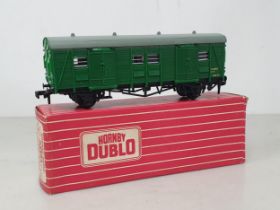 A boxed Hornby Dublo 4323 SR Utility Van, unused. Van in mint condition showing no signs of use to