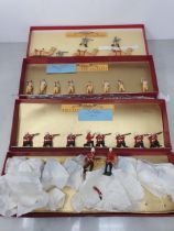 Four sets of Britains Soldiers in reproduction boxes including South Wales Borderers, Royal