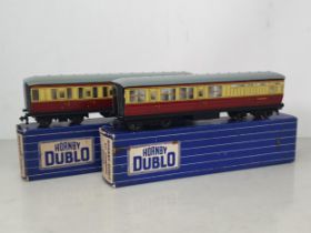 Two Hornby Dublo D11 Coaches, 1/3rd and Brake/3rd. Coaches are the later versions with BR bogies