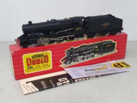 A boxed Hornby Dublo 2224 2-8-0 Freight Locomotive, unused. Loco in mint condition with no signs