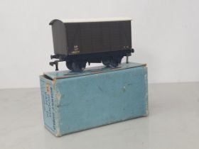 A boxed Hornby Dublo D1 SR Goods Van, Nr M-M. The van has a couple of pin point marks to one side,