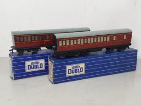 Two boxed Hornby Dublo D13 1/3rd and Brake/3rd Suburban Coaches. Both coaches in mint condition,
