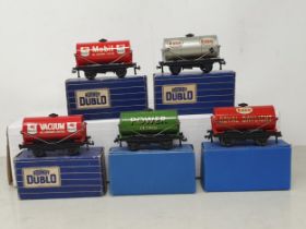 Five boxed Hornby Dublo 3-rail Tankers, mint. Tankers include 'Mobilgas', 'Esso', 'Vacuum', 'Royal