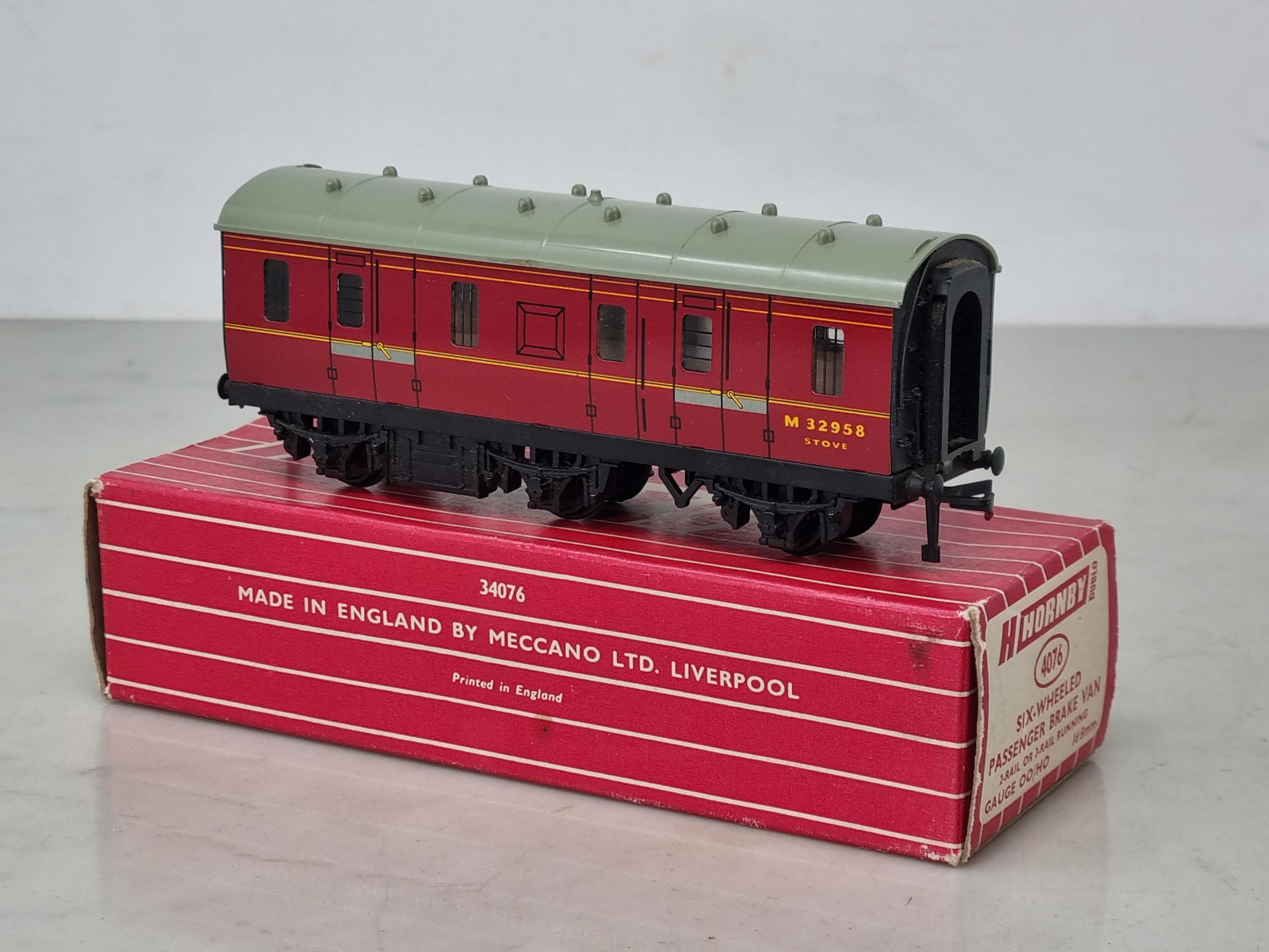 A boxed Hornby Dublo 4076 Six-wheel Passenger Brake Van, unused and in mint condition. Box in superb