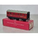 A boxed Hornby Dublo 4076 Six-wheel Passenger Brake Van, unused and in mint condition. Box in superb