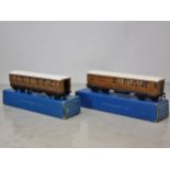 Two boxed Hornby Dublo D1 Corridor Coaches, 1/3rd and brake/3rd, near mint-mint condition. Brake box