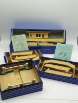 A boxed Hornby Dublo D1 Island Platform, 2x Footbridges and a Level Crossing, all near mint-mint.