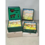 Four boxed W. Britain's Home Farm Sets including 8704 Plough Set, 8705 Farmyard Set, 8706 Forge