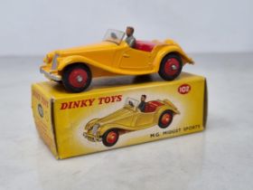 A boxed Dinky Toys No.102 dark yellow M.G. Midget Sports, Nr M-M, box nr perfect