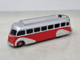 A French Dinky Toys 29E ISOBLOC red and silver Bus with rib type roof, mint condition. Ideal for