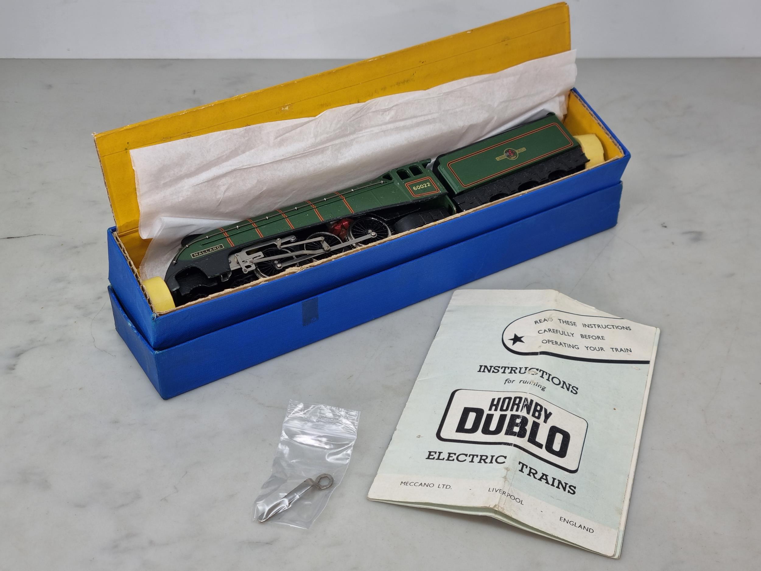A boxed Hornby Dublo 3211 nickel silver 'Mallard' Locomotive, unused and in mint condition showing