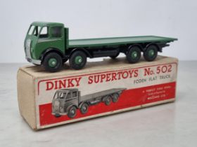 A boxed Dinky Supertoys No.502 green with black Chassis Foden Flat Truck, Nr M-M, box Ex
