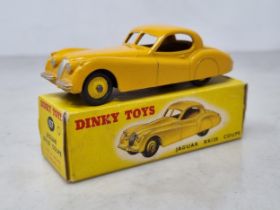 A boxed Dinky Toys No.157 yellow Jaguar XK120, Nr M-M, box Ex