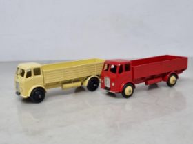A Dinky Toys 25r cream Forward Control Lorry and No.420 red Forward Control Lorry, both Nr M-M