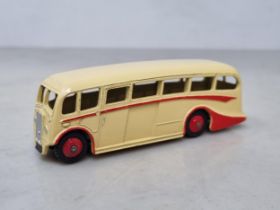 A Dinky Toys 281 Luxury Coach, rarer cream body with red flash and hubs, mint condition, ideal for