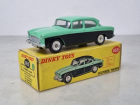 A boxed Dinky Toys No.165 scarcer green and black Humber Hawk with green roof and number plate