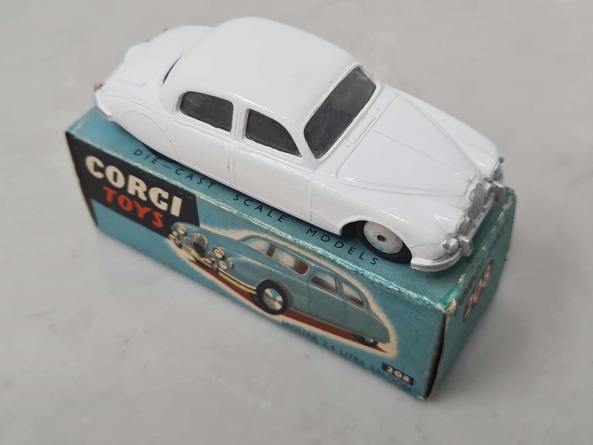 A Boxed Corgi Toys No 208 White Jaguar 2 4l Saloon VG Box VG a-boxed-corgi-toys-no-208-white-jaguar-2-4l-saloon-vg-box-vg
