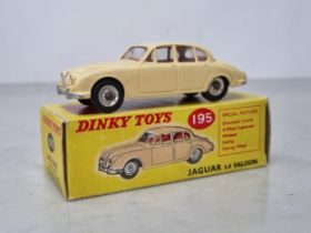 A boxed Dinky Toys No.195 cream Jaguar 3.4l, Nr M-M, box superb