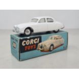 A boxed Corgi Toys No.208 white Jaguar 2.4l Saloon, VG, box VG