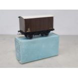 A boxed Hornby Dublo pre-war S.R. D1 Goods Van in near mint condition showing slight crazing to