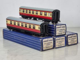 A rake of four boxed Hornby Dublo D12 Coaches comprising 3x 1/3rd and 1x Brake/3rd, all metal wheels